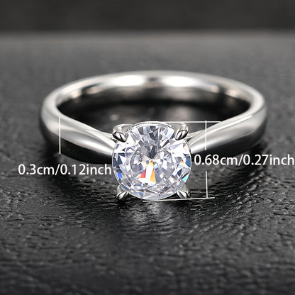An elegant and minimalist round cut synthetic Zirconia engagement ring, four-claw inlay, copper, April birthstone, anniversary gift, Valentine's Day jewelry, suitable for all seasons