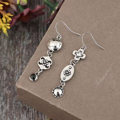 A pair of new retro punk style asymmetrical pattern flower geometric pendant alloy earrings