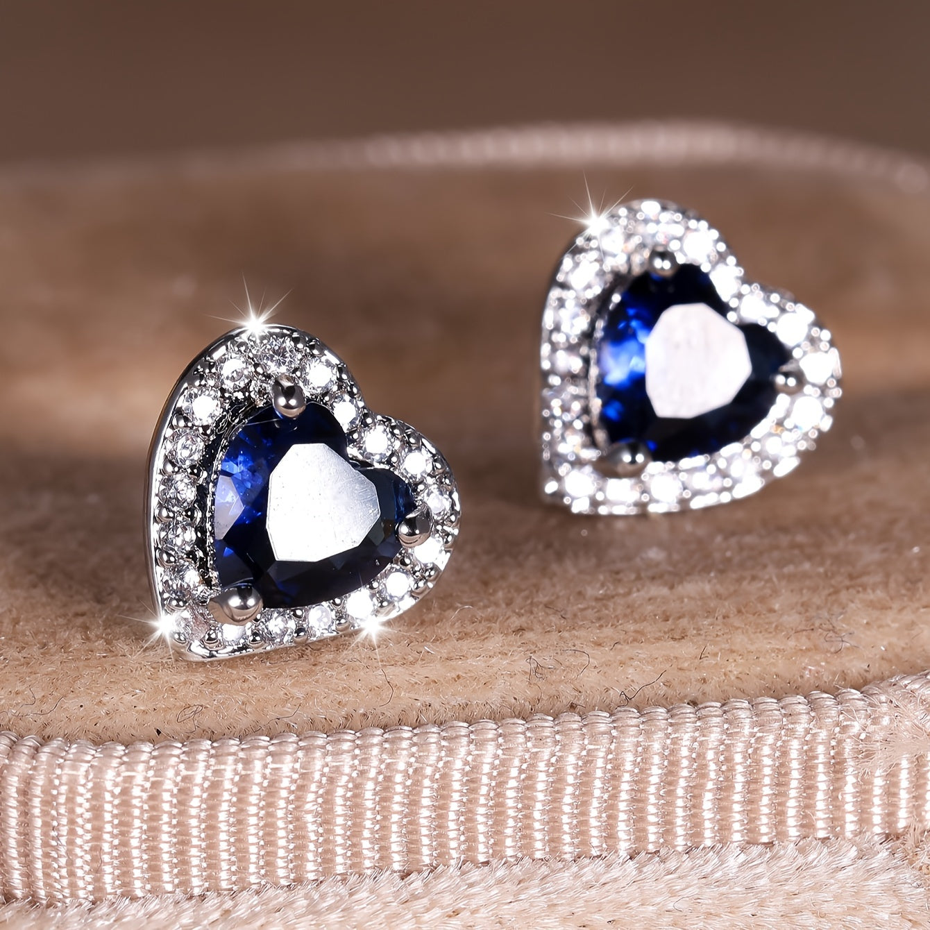 2 unique heart-shaped earrings with blue synthetic zirconia earrings for Valentine's Day