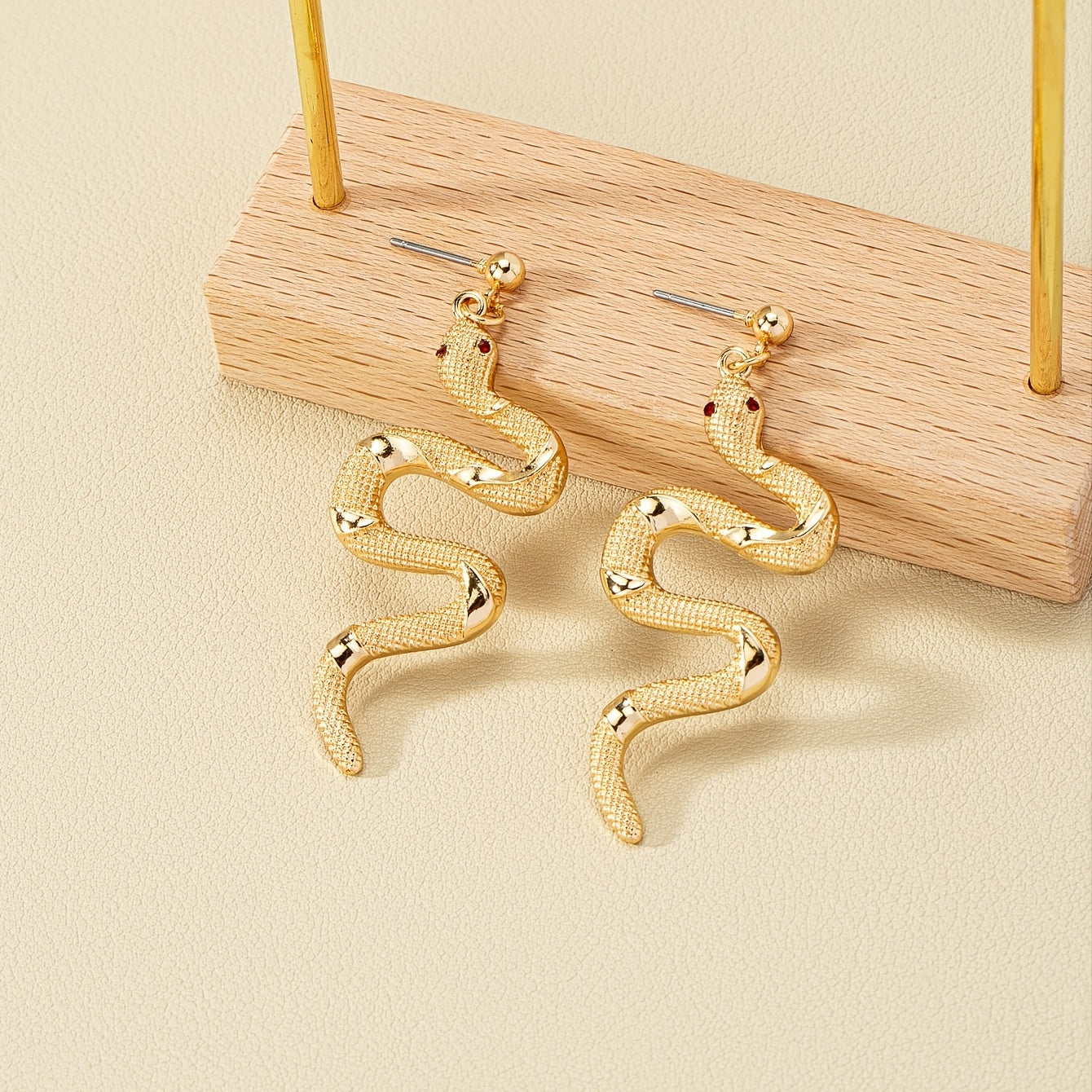Elegant snake stud earrings, 14K gold galvanized alloy, embellished with rhinestones, using stainless steel ear needles, minimalist style suitable for daily and holiday wear