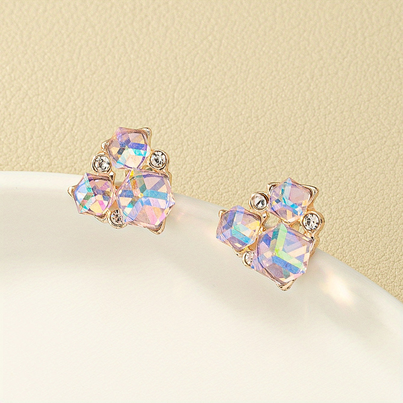 A pair of chic and whimsical irregular geometric women's earrings - stainless steel studs, zinc alloy, perfect for everyday wear or on vacation