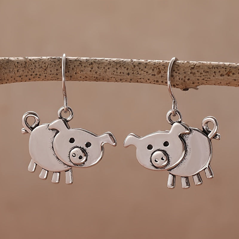 A pair of bohemian vintage pig-shaped pendant earrings, 925 silver-plated copper hooks, and charming animal jewelry for Casual Attire and gift giving, perfect for the Christmas season.