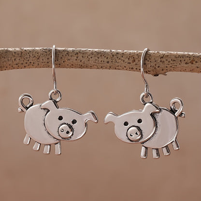 A pair of bohemian vintage pig-shaped pendant earrings, 925 silver-plated copper hooks, and charming animal jewelry for Casual Attire and gift giving, perfect for the Christmas season.