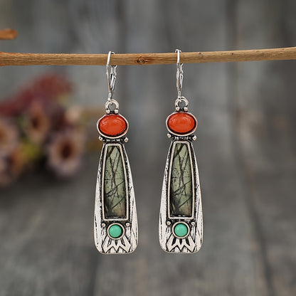A pair of bohemian tribal-style silver zinc alloy drop earrings with synthetic gemstones and iron ear needles, long drop earrings for everyday wear