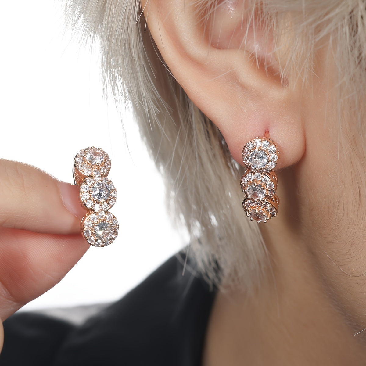 Elegant gold-toned sparkling Zirconia pendant earrings - perfect for weddings and everyday glamour, winter and New Year's wear