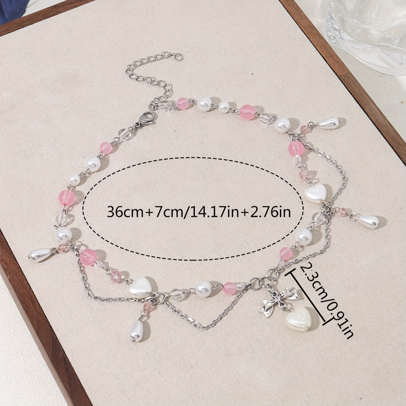 An elegant Y2K-style necklace with a butterfly bow and heart-shaped pendant, imitation pearl tassels, and cute fashion accessories for parties, birthdays, and holidays