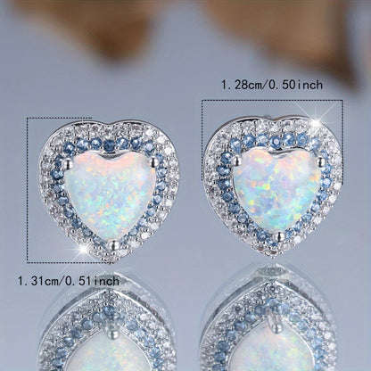 A pair of elegant and luxurious heart-shaped synthetic jade earrings for women as a wedding, party or jewelry gift.