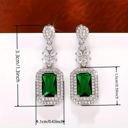 The elegant earrings, made of luxurious sparkling faux zircon and vintage emeralds, are perfect for women to wear at engagement parties and formal events, showcasing the fine craftsmanship found in fashion jewelry.