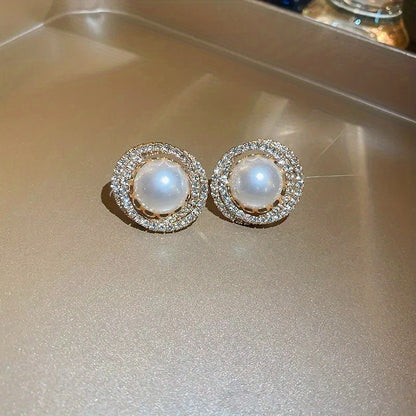 Delicate round stud earrings with imitation pearls for an elegant retro style, suitable for women dating and weddings