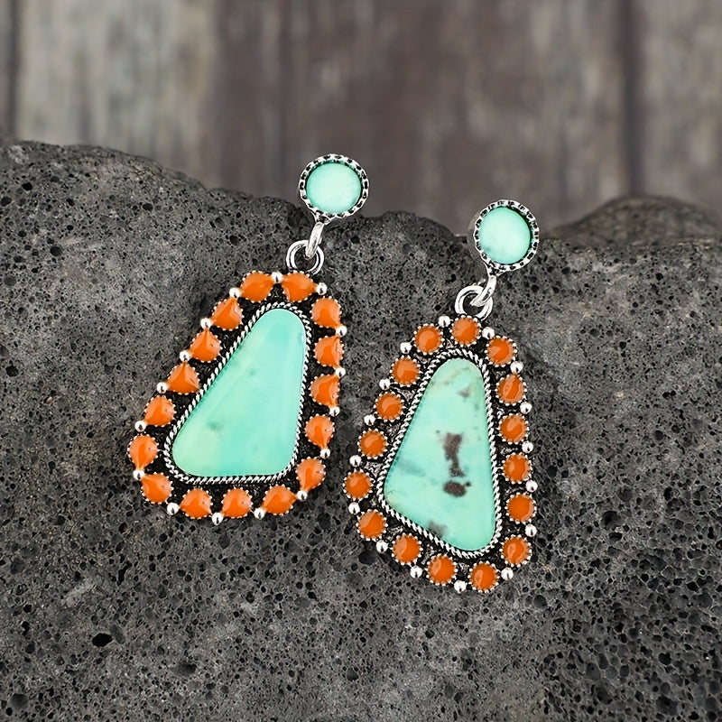 A pair of Bohemian geometric resin stickers with ethnic stylish alloy earrings.