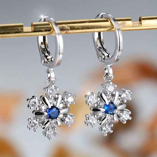 A pair of copper snowflake stud earrings with blue synthetic Zirconia, winter luxury fashion jewelry, suitable for women, cute fringed long stud earrings, suitable for Christmas and Valentine's Day
