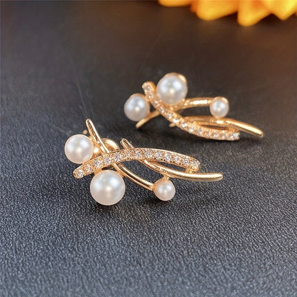 A pair of elegant copper baroque pearl stud earrings, synthetic April birthday stones, suitable for everyday and party wear, nickel-free, Maldera holiday accessories