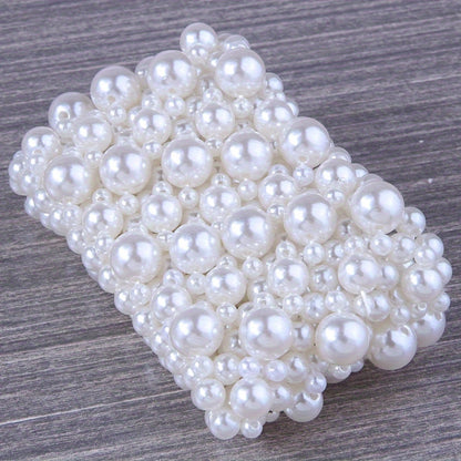 A white fake pearl beaded wide bracelet, elegant temperament, elastic and retractable bracelet