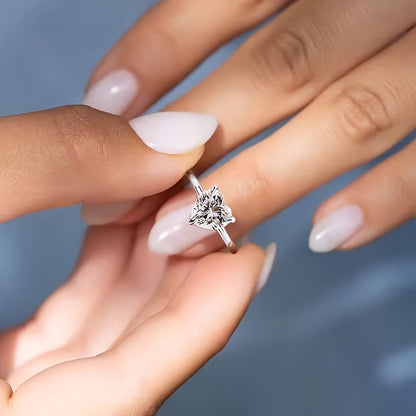 Ladies' luxury bohemian heart-shaped zircon engagement ring with elegant high-end three-claw design and copper bottom, perfect for weddings and banquets