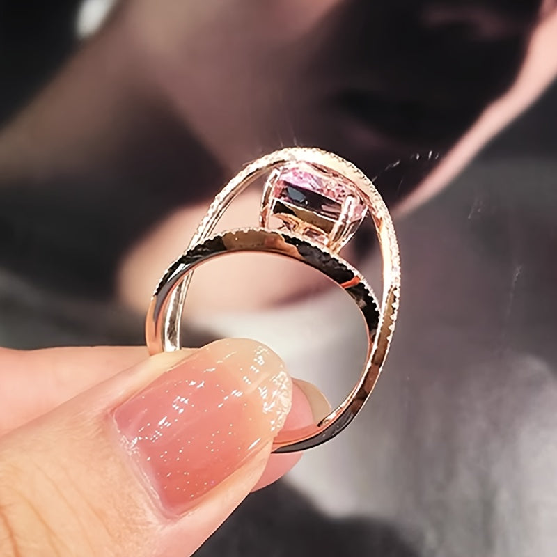 Elegant pink synthetic gemstone ring with unique cross design - cherry blossom inspired, perfect for casual wear and party occasions, copper base, sparkling embellishment