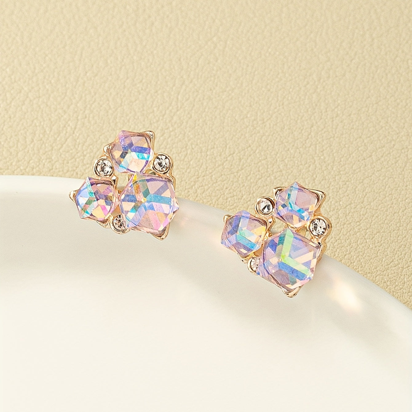 A pair of chic and whimsical irregular geometric women's earrings - stainless steel studs, zinc alloy, perfect for everyday wear or on vacation